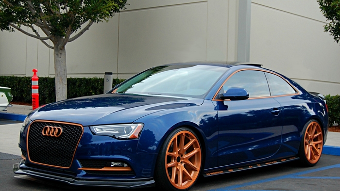 Custom blue Audi A5 coupe with copper accents