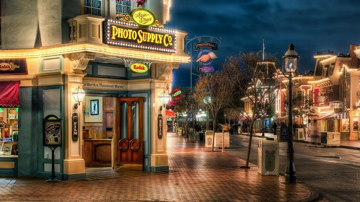 Photo Supply Co. shop on Main Street at night