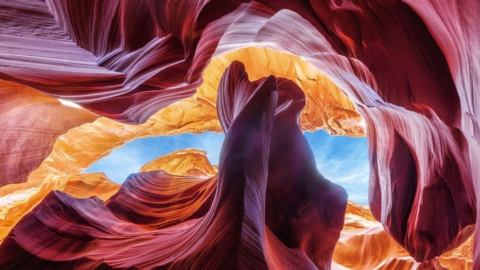 Antelope Canyon sandstone formations and blue sky