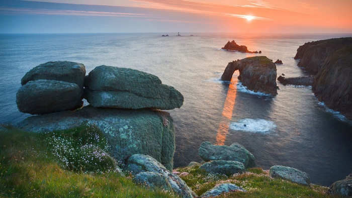 Coastal rock formations at sunset with ocean view
