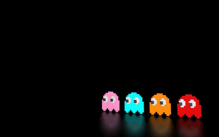 Pac-Man Ghosts on Black Background