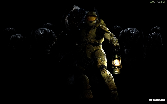 Master Chief holding a lantern in darkness