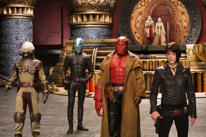 Hellboy and allies in a grand hall