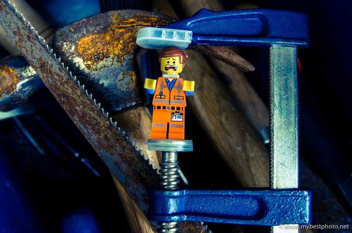 Emmet from The Lego Movie in a clamp