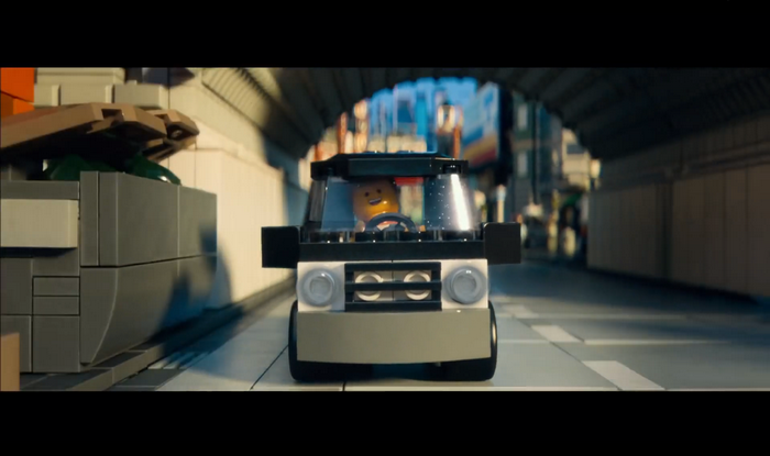 Emmet from The Lego Movie driving a car