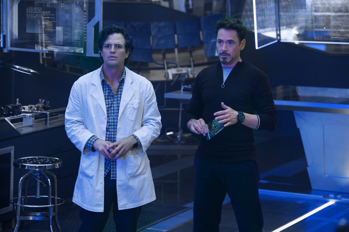 Bruce Banner and Tony Stark in a laboratory