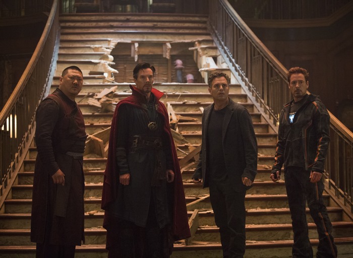 Wong, Doctor Strange, Bruce Banner, and Iron Man in damaged building