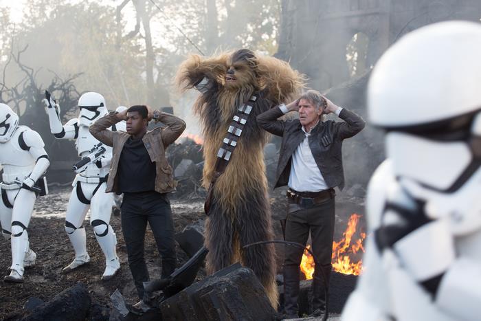 Finn, Chewbacca, and Han Solo captured by Stormtroopers