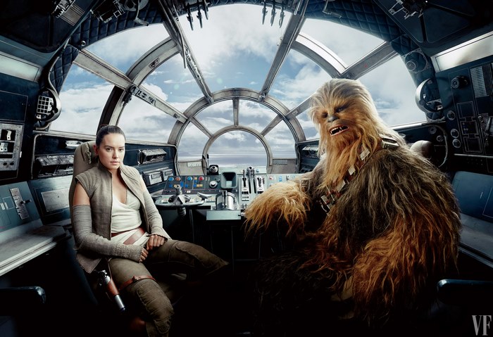 Rey and Chewbacca in the Millennium Falcon cockpit