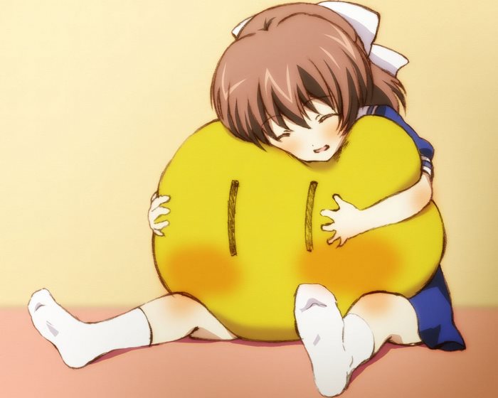 Ushio Okazaki hugging a yellow plush toy