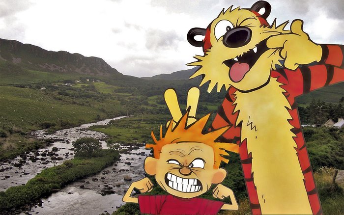 Calvin and Hobbes in a scenic landscape