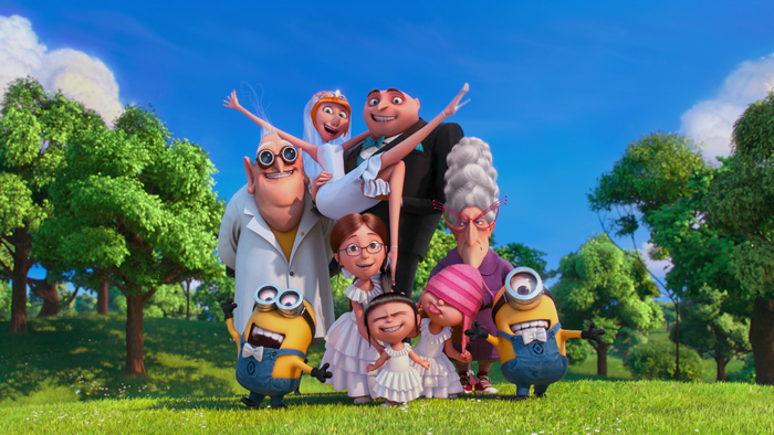 Gru and his family with minions in a park