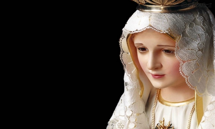 Statue of Mary wearing a crown and veil