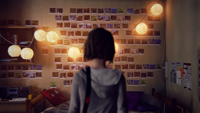 Maxine Caulfield in her room with photos