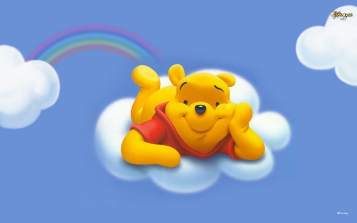 Winnie the Pooh on a cloud with a rainbow