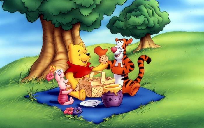 Winnie the Pooh, Tigger, and Piglet having a picnic