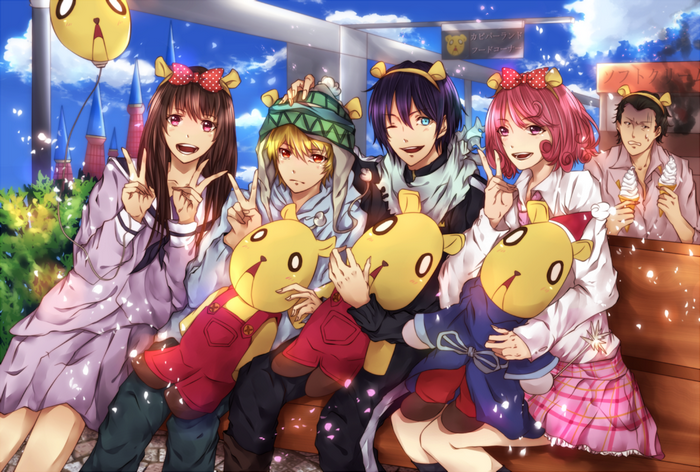 Group of friends with stuffed animals at amusement park