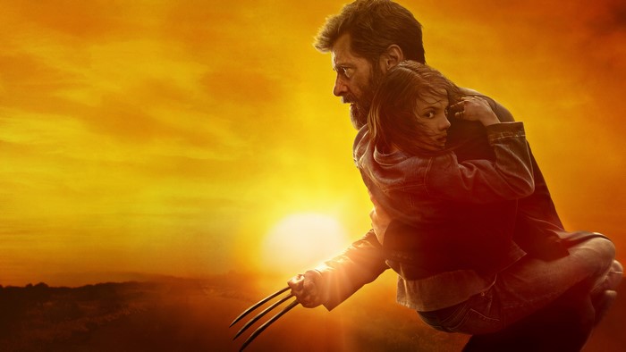 Logan and X-23 in front of sunset