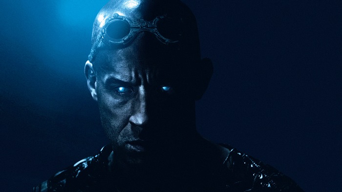 Riddick with glowing eyes and goggles