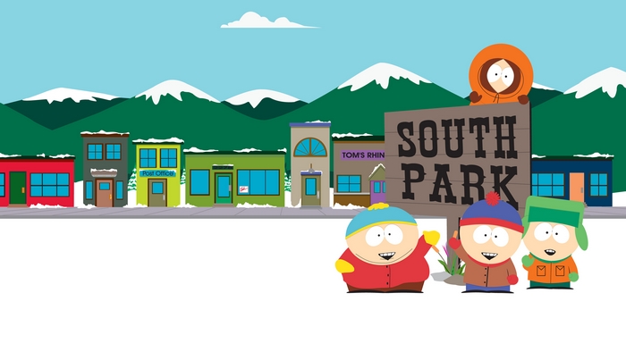 South Park characters in front of the town sign