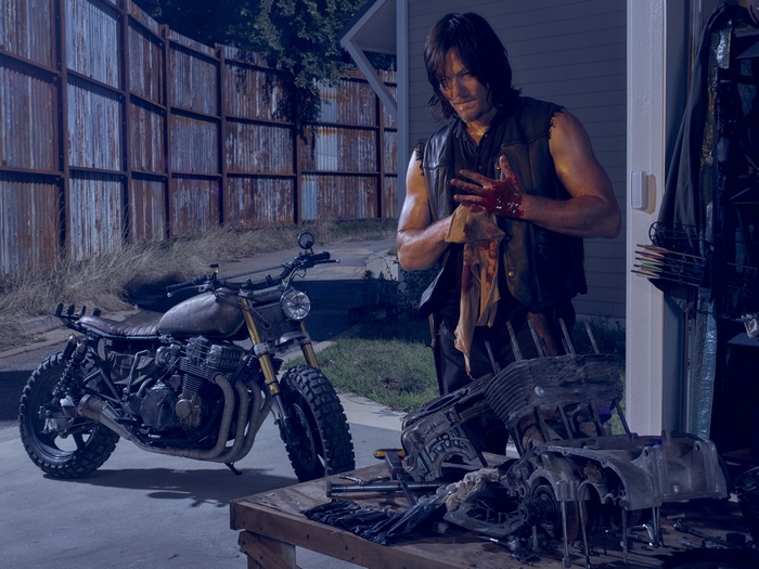 Daryl Dixon cleaning bloody hands near motorcycle