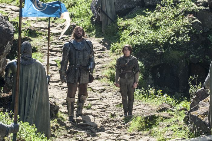 Sandor Clegane and Arya Stark on a rocky path