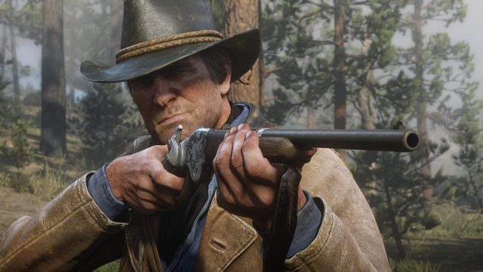 Arthur Morgan aiming a rifle in a forest