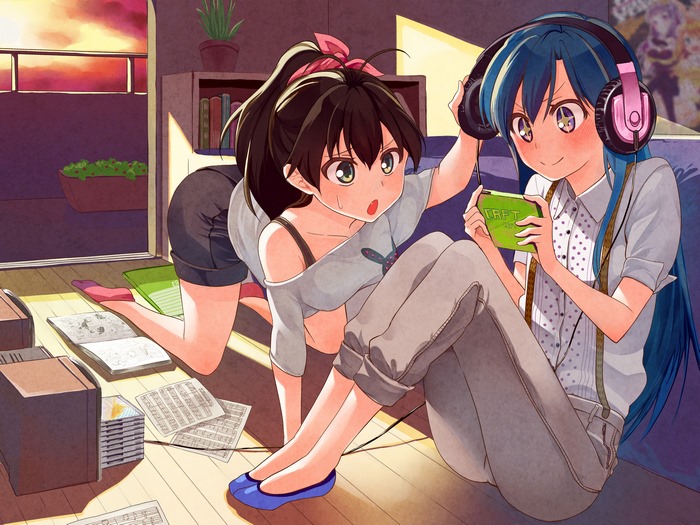 Chihaya Kisaragi playing a handheld game