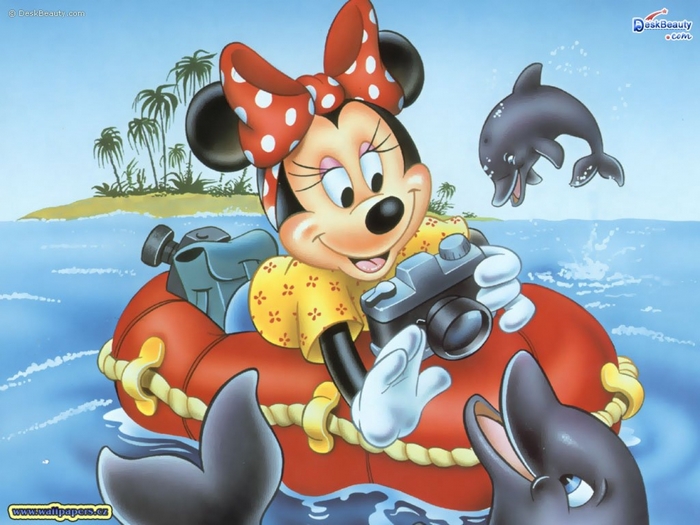 Minnie Mouse in a boat with dolphins