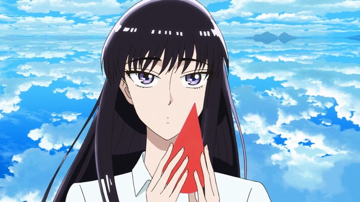 Akira Tachibana holding a red object