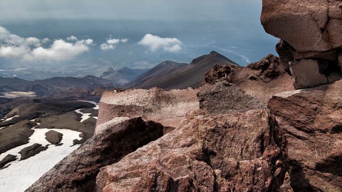 Rocky mountain landscape with snow patches