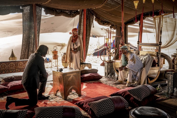 John Wick in a desert tent