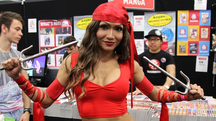 Elektra from Marvel Comics holding sai weapons