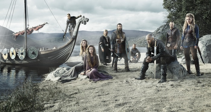 Vikings characters with a longship