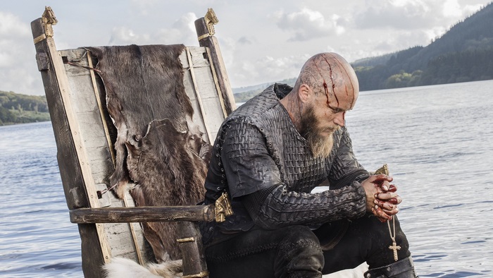 Ragnar Lothbrok sitting on a throne