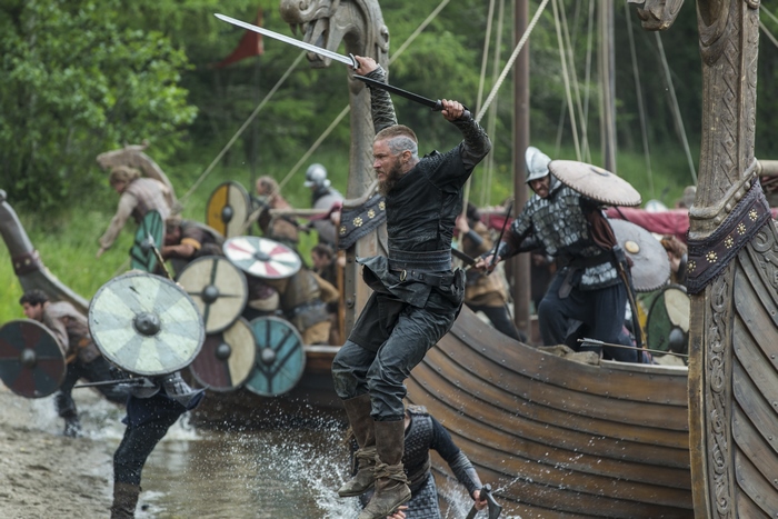 Ragnar Lothbrok jumping from a Viking ship