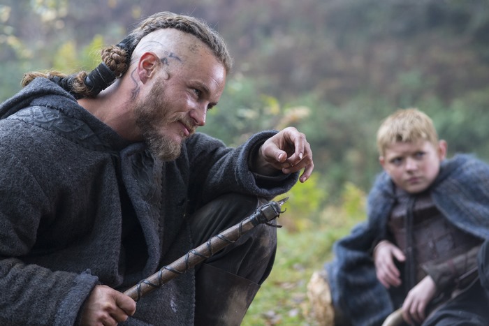 Ragnar Lothbrok from Vikings with a young boy
