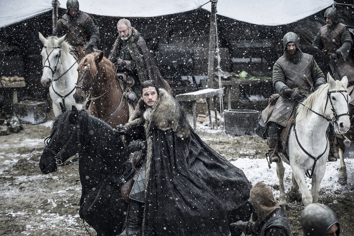 Jon Snow and Davos Seaworth on horseback in snow