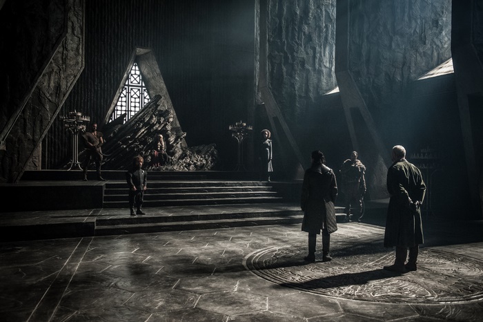 Davos Seaworth and others in the throne room