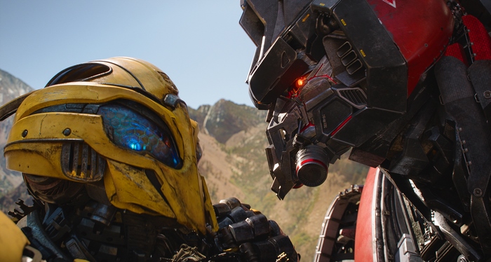 Bumblebee and another Transformer in a standoff