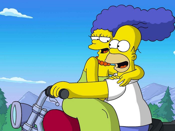 Homer and Marge Simpson riding a motorcycle