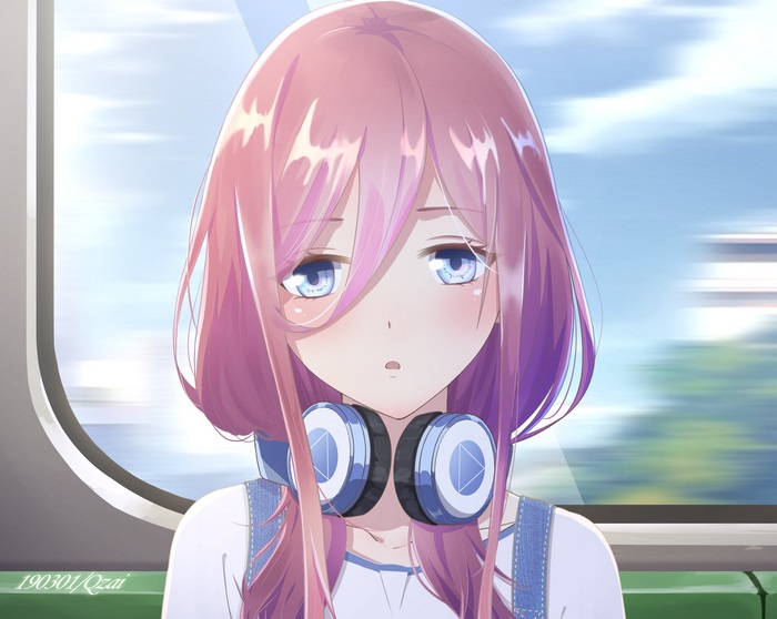 Thoughtful Miku Nakano with Headphones on Train