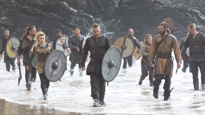 Lagertha Lothbrok and Vikings walking on a beach