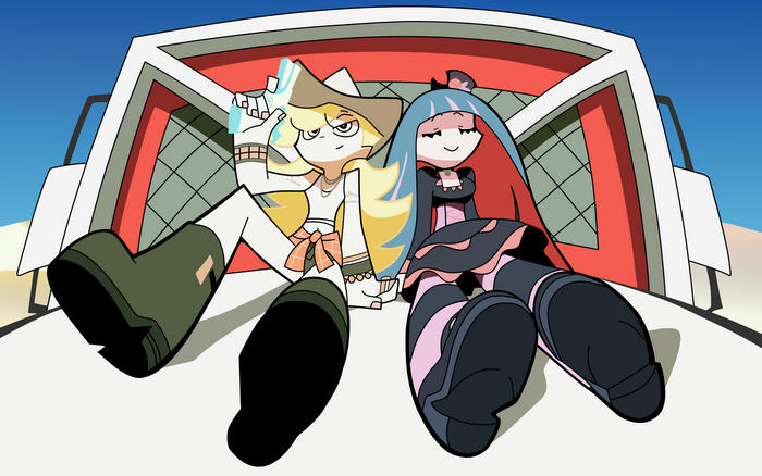 Anarchy and Stocking sitting in a vehicle