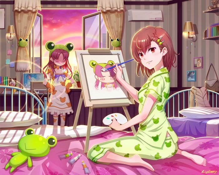 Two girls in frog pajamas painting in a bedroom