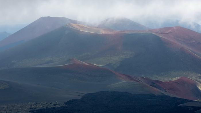 Volcanic landscape with craters and lava fields
