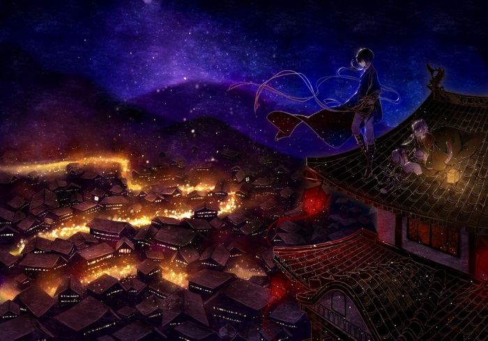 Two men on a rooftop overlooking a city at night