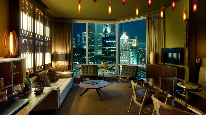 Luxury hotel suite with city view at night