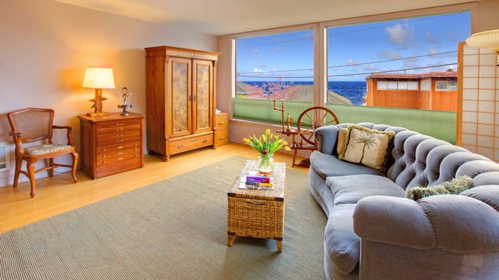 Living room with ocean view and antique furniture