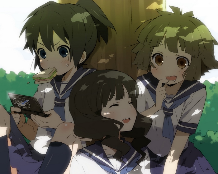 Three girls in sailor uniforms sitting under a tree